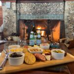 Bed and Breakfast with Fireplace Charcutier board and Food