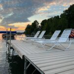 Bed and Breakfast Dock on the lake with lounge chairs