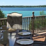 Breakfast table overlooking a view of Torch Lake