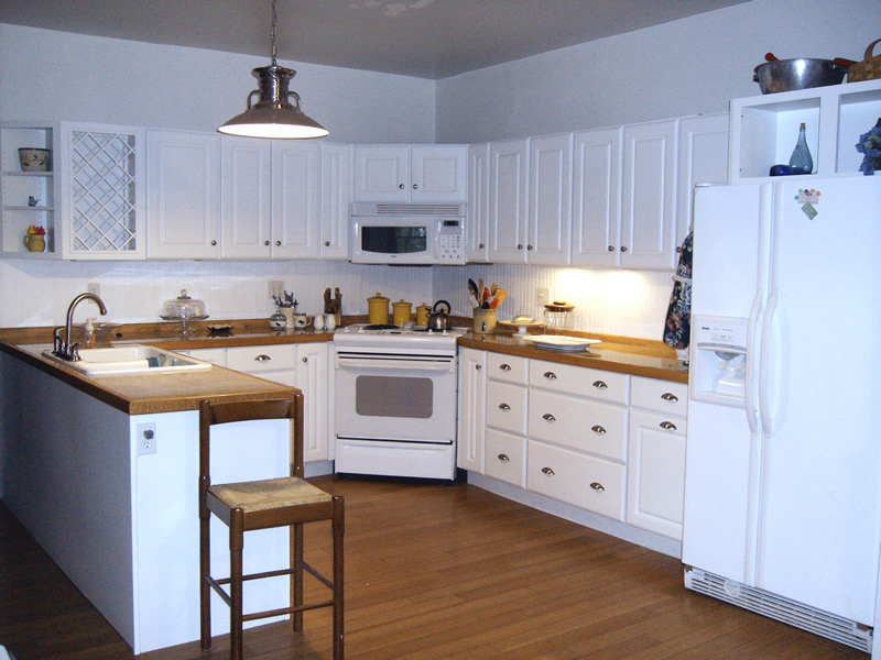 White Kitchen at Cottonwood Inn Bed and Breakfast in Empire Michigan