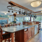 Spring Light House Bed and Breakfast interior kitchen with large island and wrap around windows